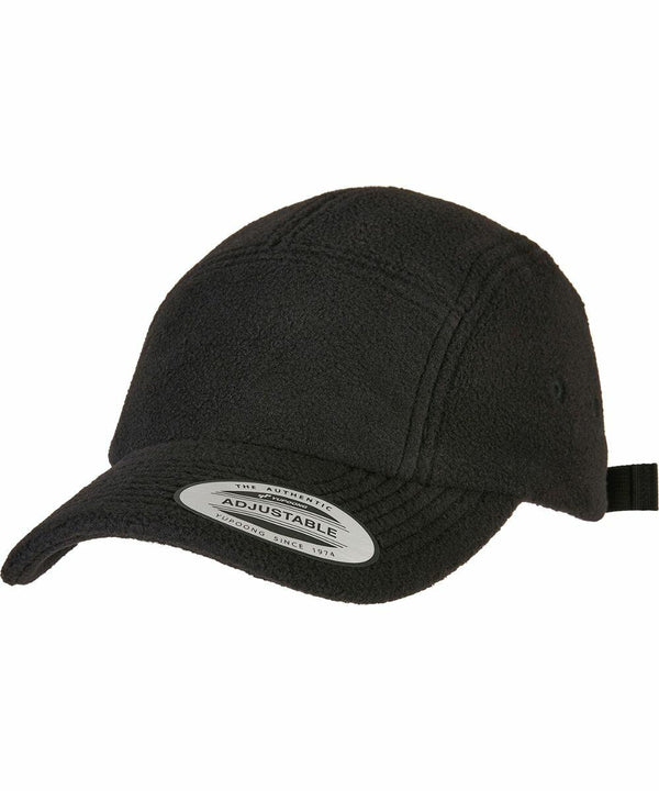 A black adjustable baseball cap with a curved brim and a wool-like texture. The YP242 Flexfit By Yupoong has a sticker on the brim indicating it is adjustable.