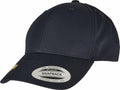 A Flexfit By Yupoong YP244 snapback cap in black, featuring a flat visor and a circular sticker on the brim.