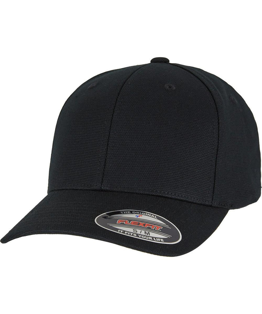 The Flexfit by Yupoong YP Signature cotton canvas spa (RXZ2109) is a plain black baseball cap with a curved peak and product sticker on the visor, shown angled against a white background.