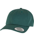 A teal green Flexfit by Yupoong low-profile cotton twill (6245CM) baseball cap with a curved peak, adjustable strap, and a peak sticker reading "The Authentic Adjustable Yupoong Since 1974.